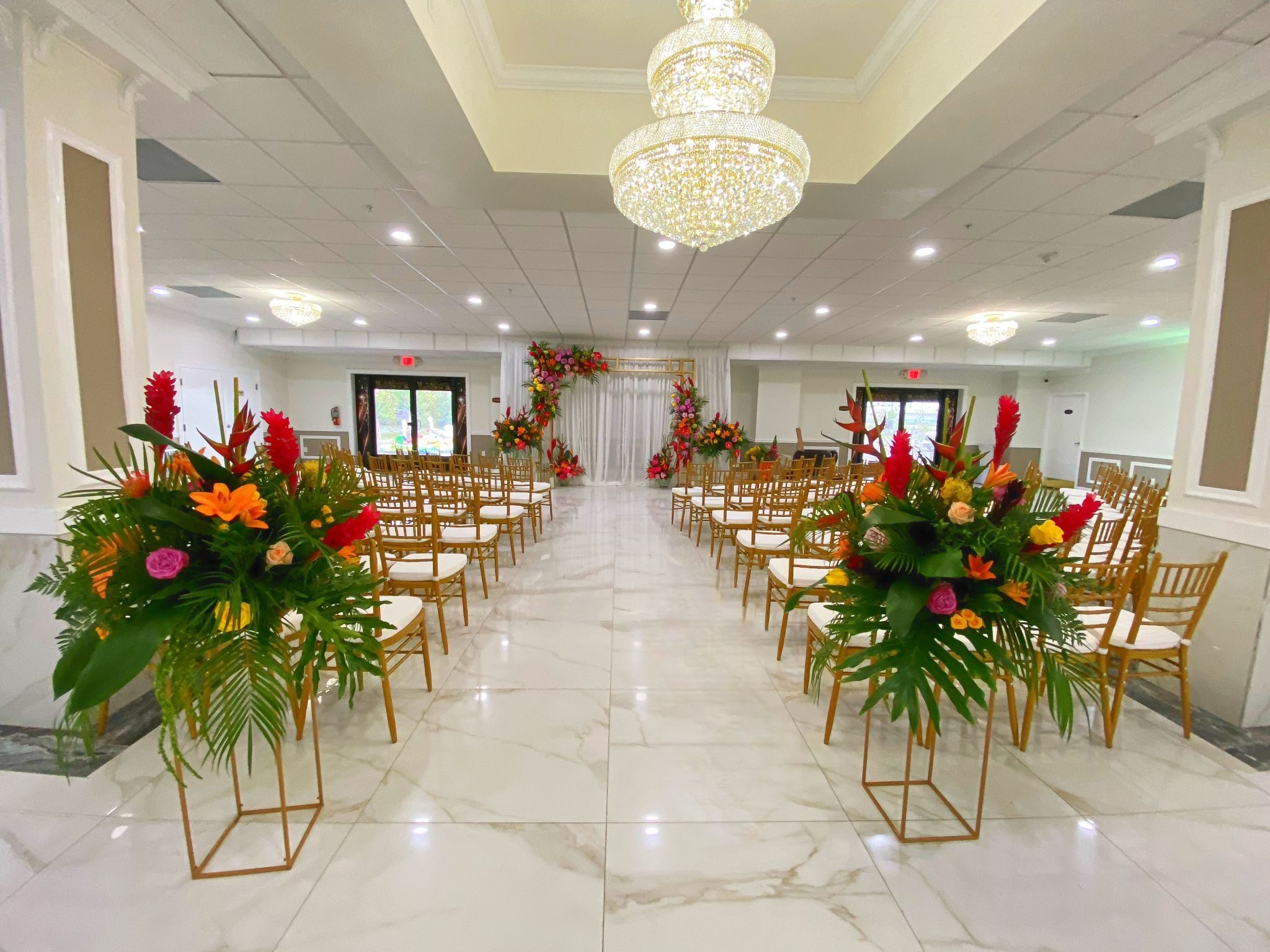 Wide view of the main event hall with elegant table settings.